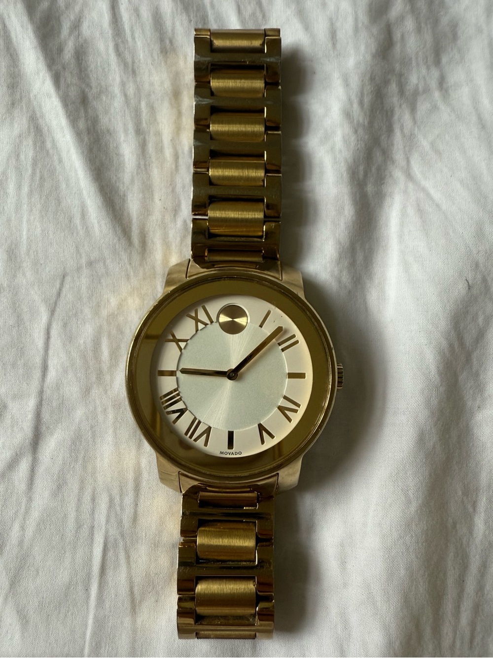 Movado Bold gold watch with box and card